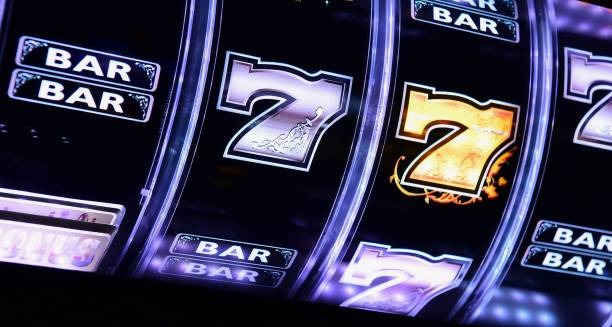 Live Casino Hold'em table with dealer and cards